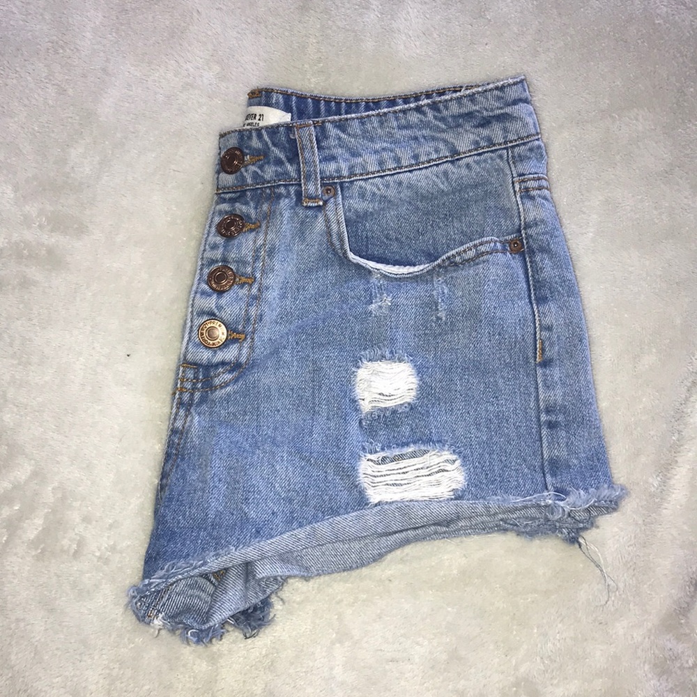 Light blue ripped booty shorts